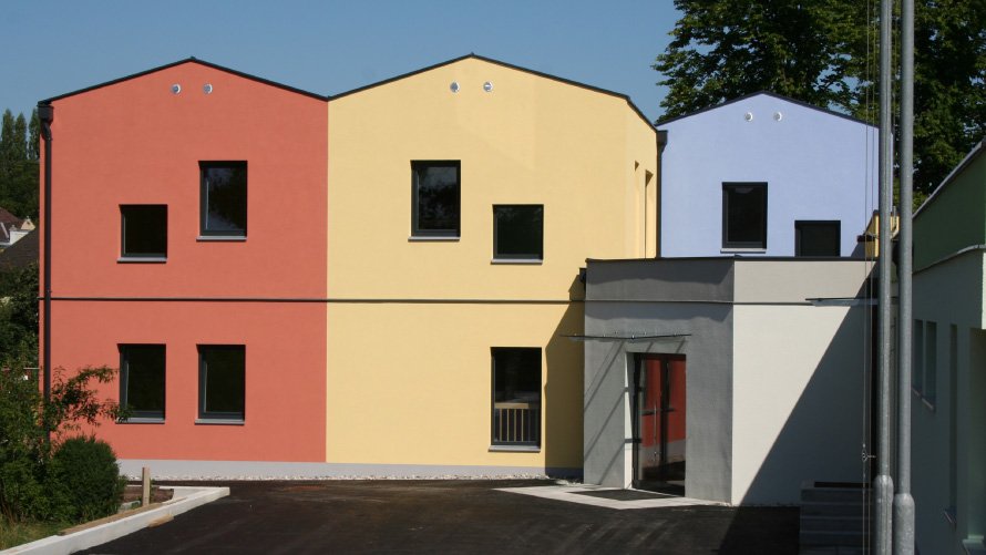 Ocieplenie ścian od zewnątrz Multipor ETICS elewacja kolorowe domy